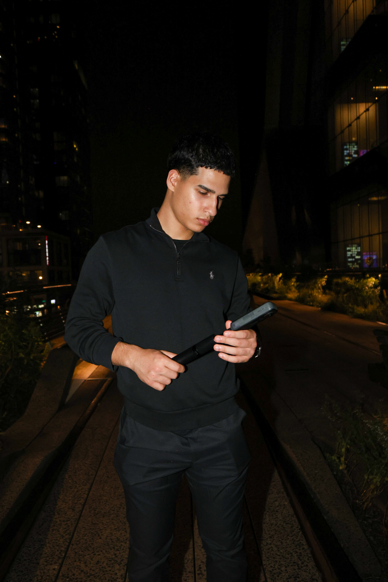Irving Aguilera, founder of A1Media, on location at night